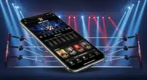 Celular exibindo interface de aplicativo com lutas e lutadores da WWE sobre um ringue iluminado por refletores, representando o uso de apps para acompanhar WWE ao vivo e conferir estatísticas dos combates